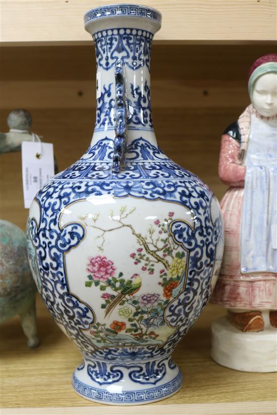 A Chinese famille rose and blue and white vase